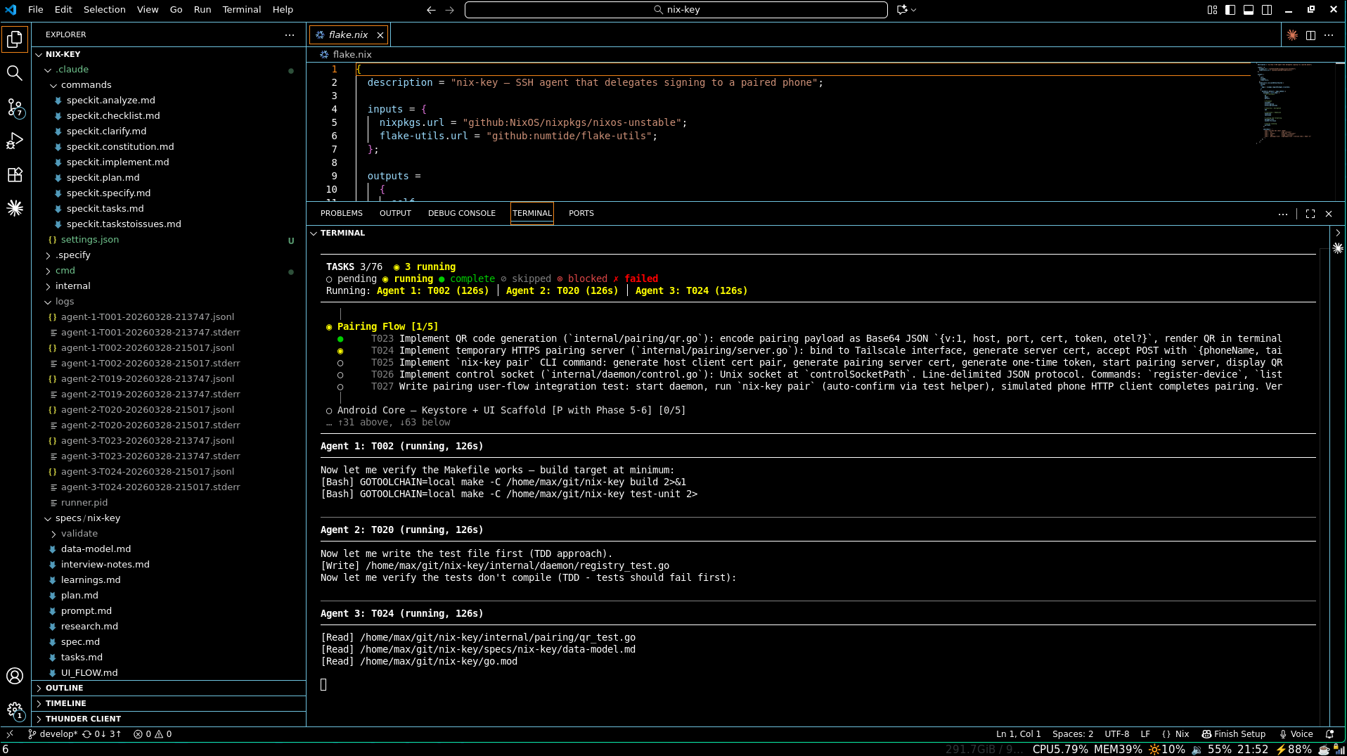 Three spec-kit agents running in parallel inside the terminal, each working on a different implementation task from Phase 1